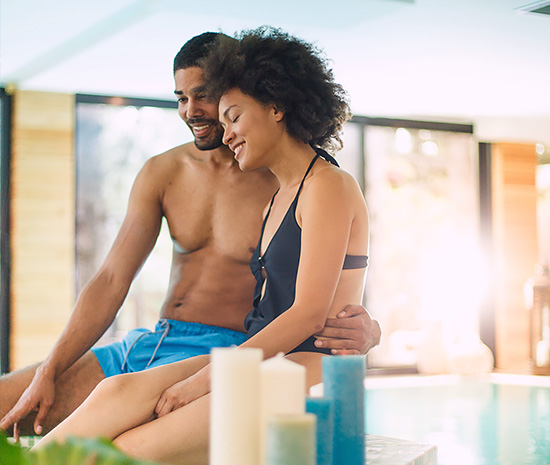 couple by the pool