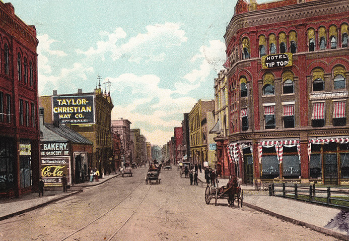 old town photo with people walking on sidewalk