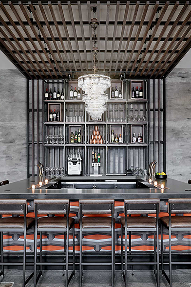 bar top with seating around it