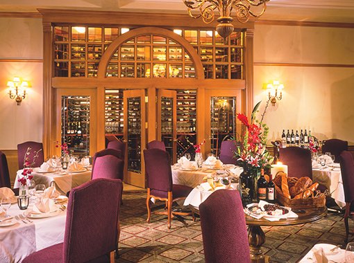 Wine dining room with wine display in background