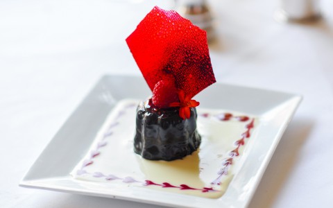 plate of dessert with red accents 