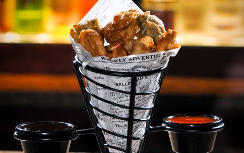 fried pickle appetizer spread on the bar 