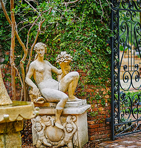 Statue with brick wall background
