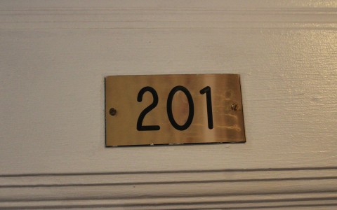 close up photo of 201 sign