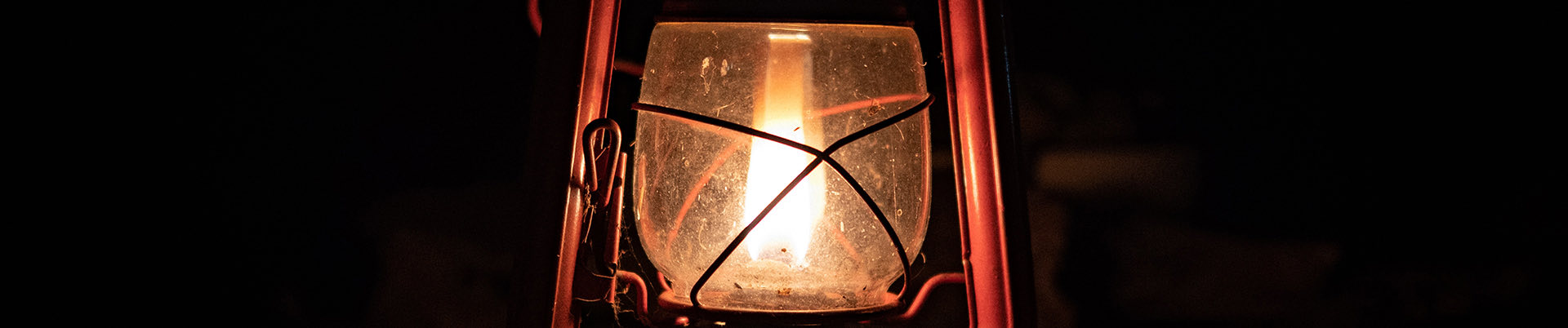 Close up of a lantern lit with a flame