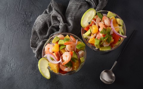 Top view of two ceviche cups 