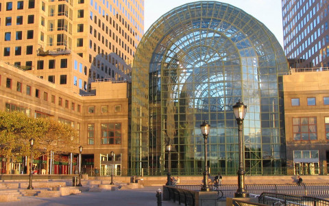 building with a large rounded glass area in the center