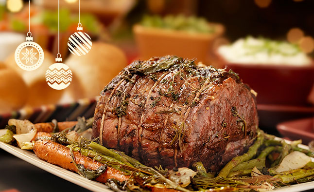 roast beef on a plate with vegetables