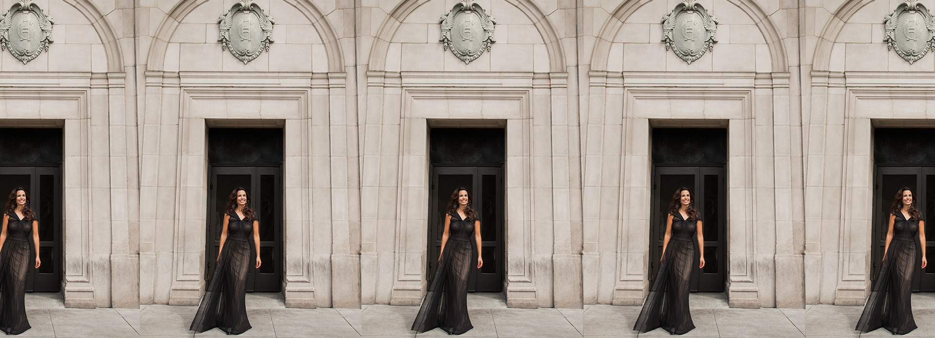 woman posing in front of a building