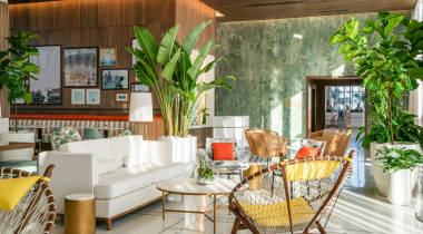 sitting area with couch and plants