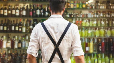back of a bartender in a bar