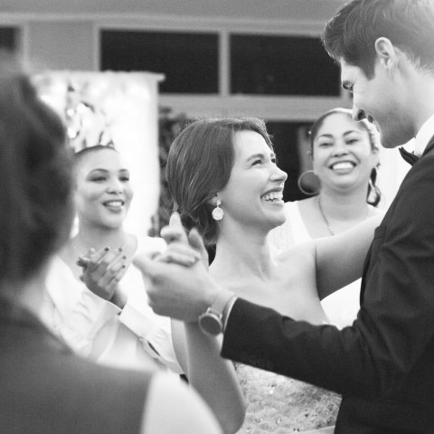 couple surrounded by friends having their first dance