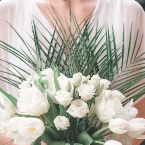 bouquet of white roses with green foliage