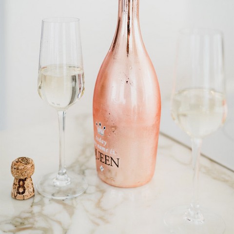 large pink bottle of champagne