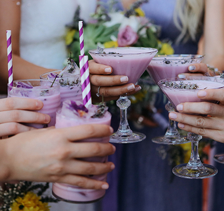bridal party drinking fun purple cocktails