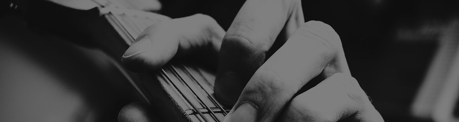 hand strumming a guitar