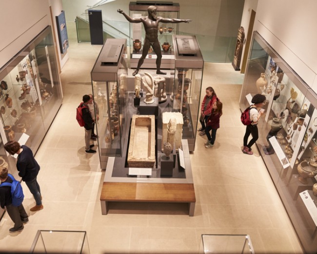 overhead view of busy museum interior with visitors