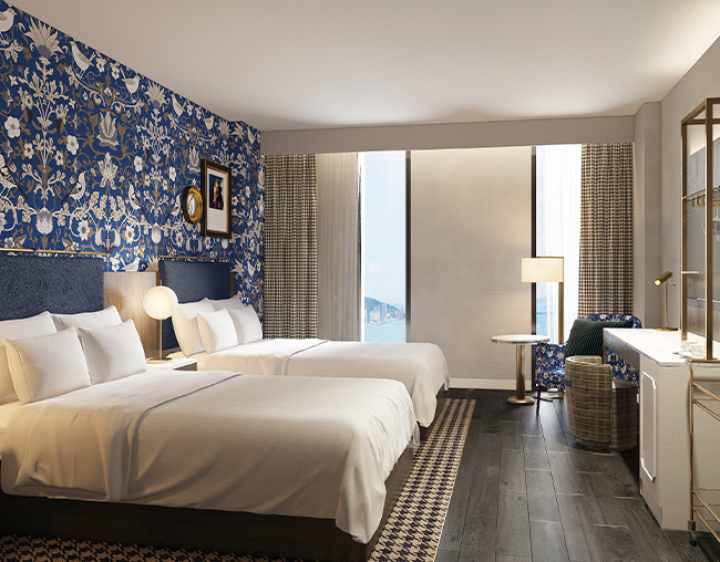 queen guest room with elegant blue wallpaper