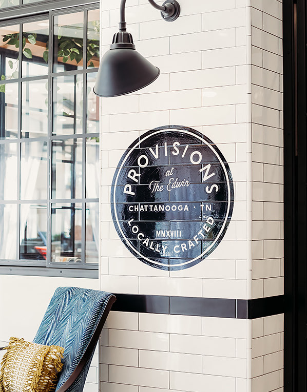 view of a wall with the logo of Provisions restaurant
