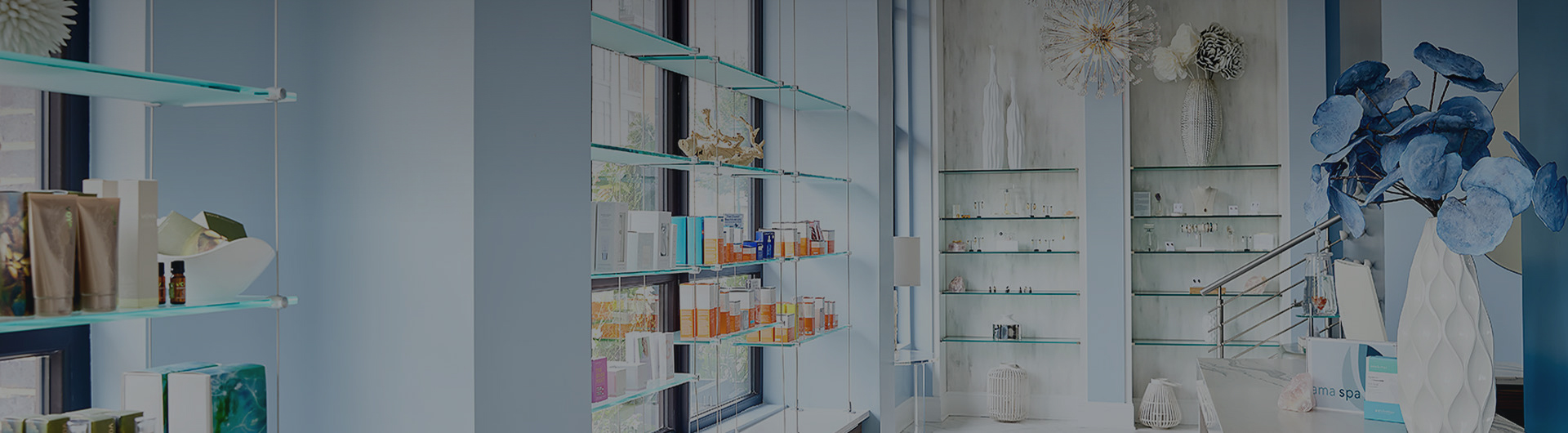 spa products on display shelves with a dark overlay