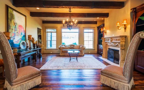 Internal view of a living room with a fireplace 