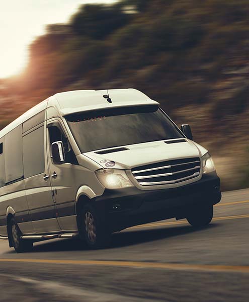 View of a luxurious transit van on a road