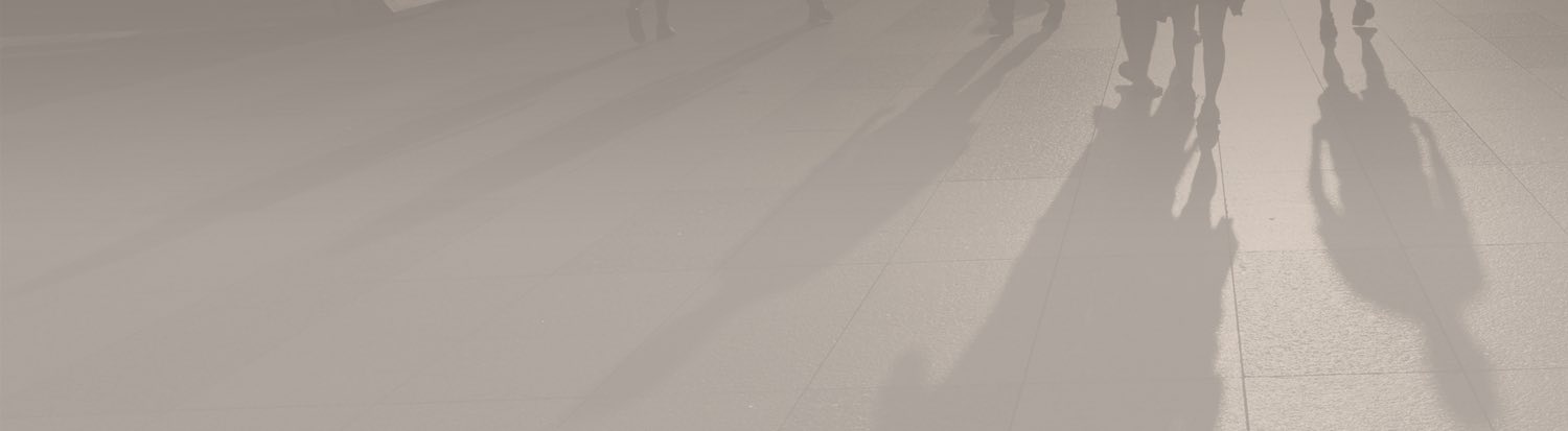 shadow of man on a sidewalk