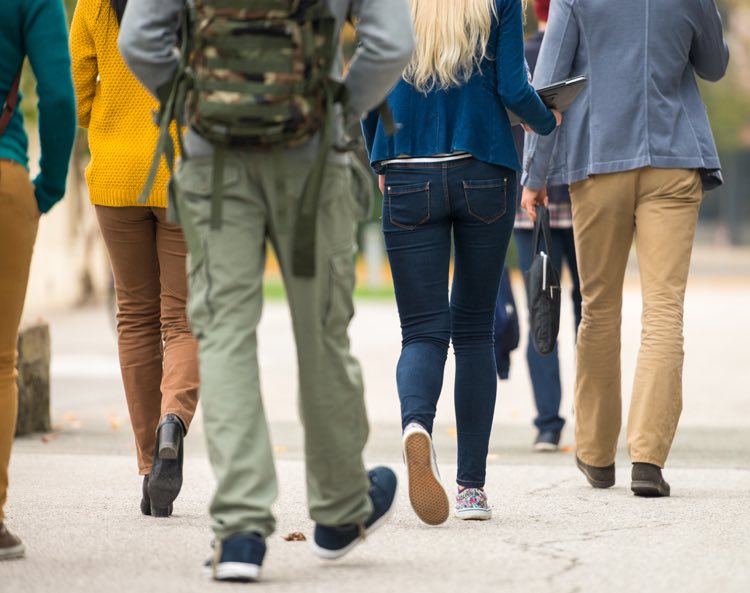 students walking to class wearing casual clothing