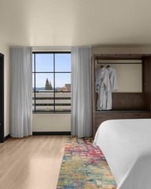 Standard King Bedroom with king bed, closet and desk