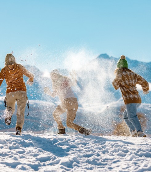 young people in snow fight