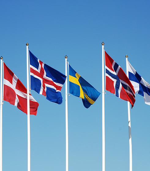 scandinavian flags in a blue sky 
