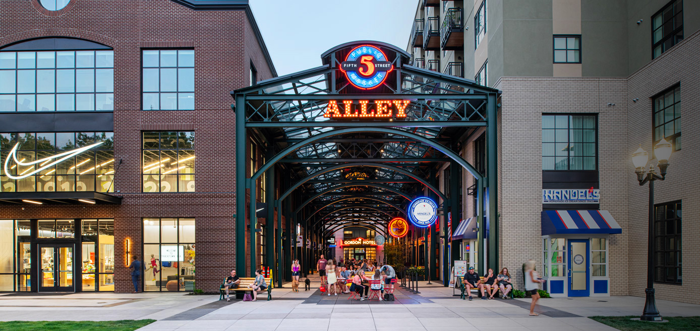 view of market alley entrance with neon sign saying 5 public market alley 2