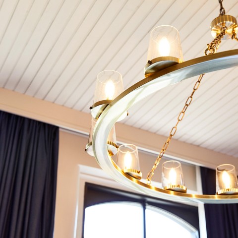 view of lighting fixture hanging from ceiling