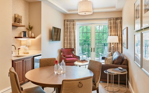hotel room with dining and living room