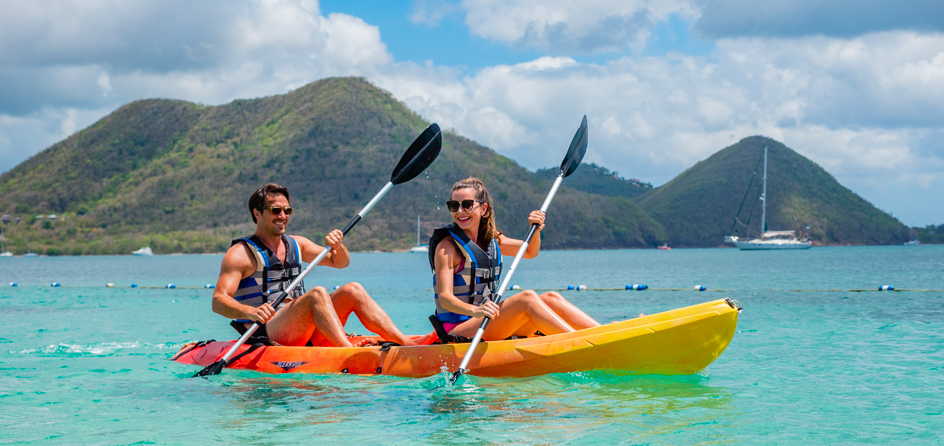 couple kayaking in ocean