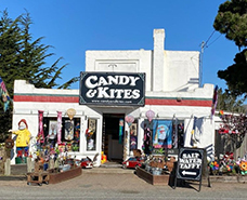 exterior of white candy and kites building
