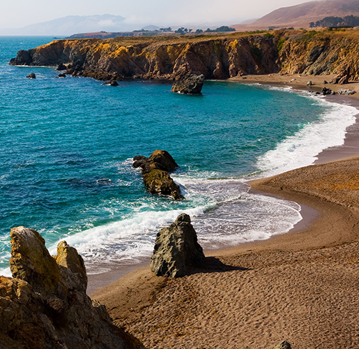 beautiful inlet surrounded by cliffs
