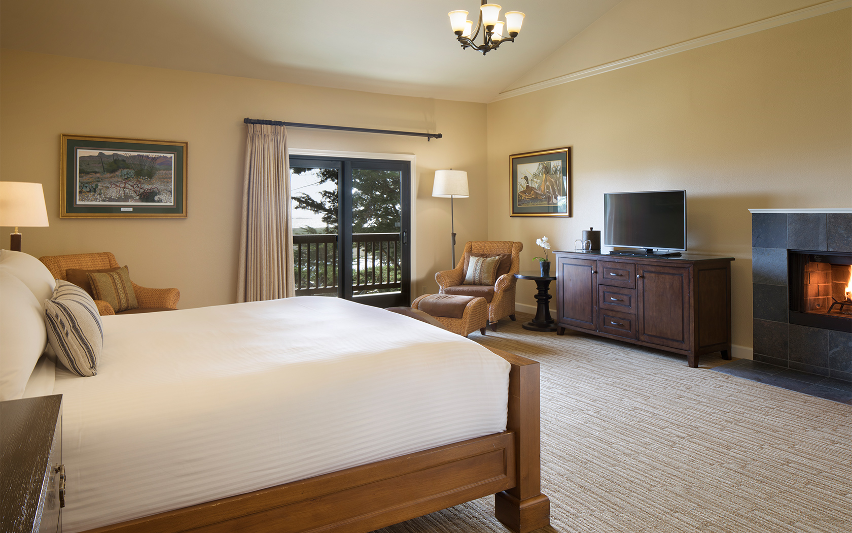 nice hotel room with a bed and fire place