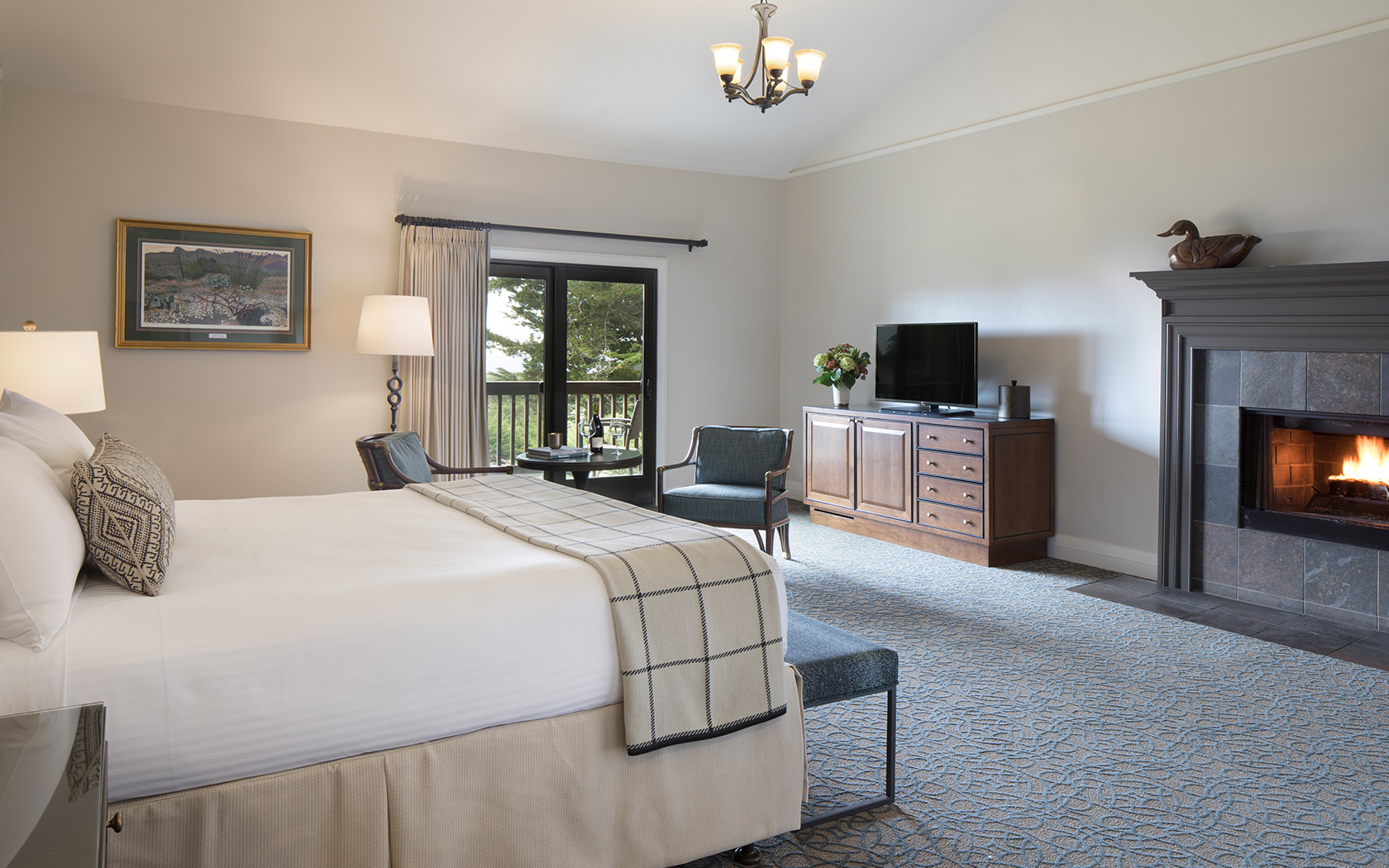 second floor hotel room with a fire place