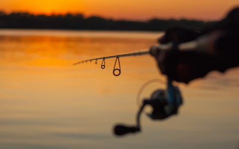 linear view from fishing rod during the sun set 