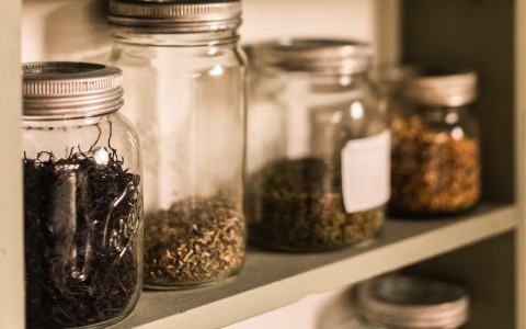 close up view of seasoning in mason jars 