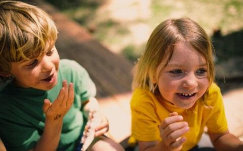 two children laughing 
