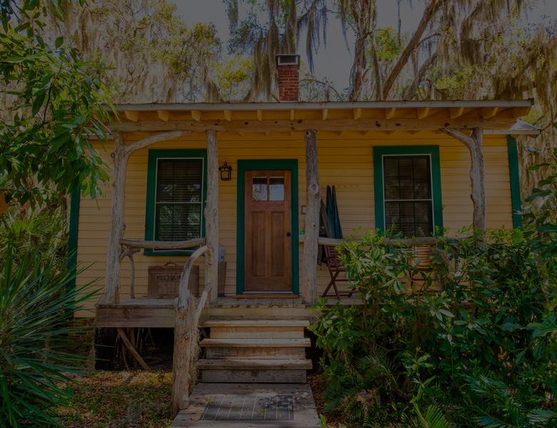 orange cottage with deck