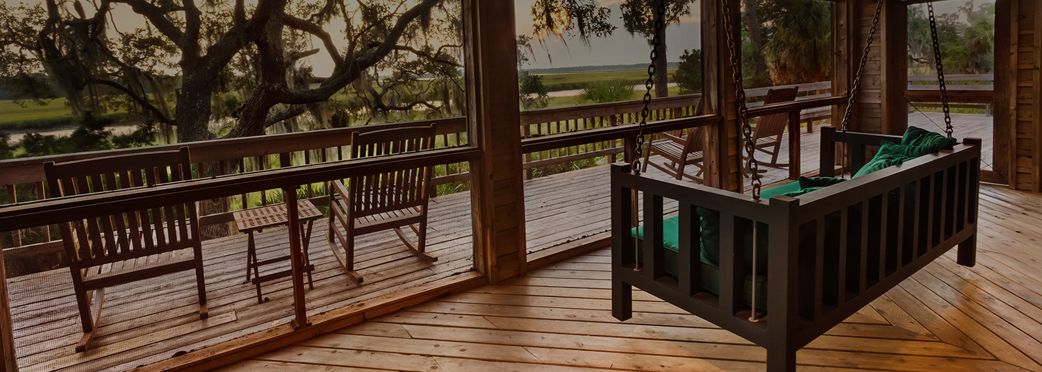 view of porch with a porch swing