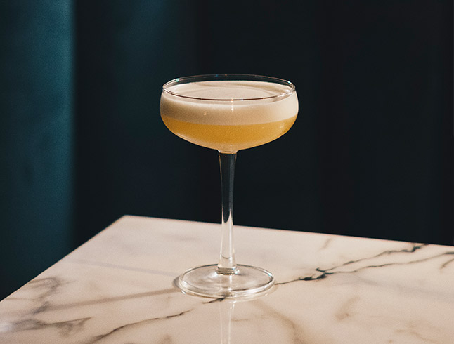 freshly made cocktail in a decorative glass