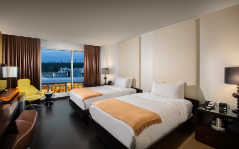 two queen beds within the same city view room