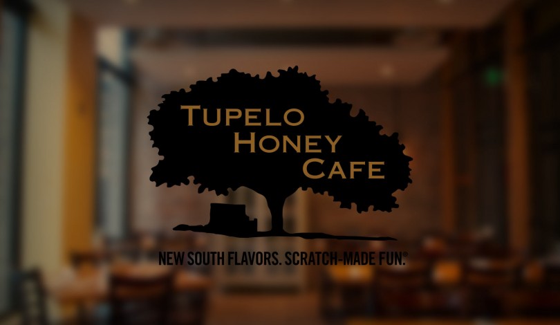 Tupelo Honey Cafe Logo On A Glass Window Tupelo Honey Cafe Logo On A Glass Window