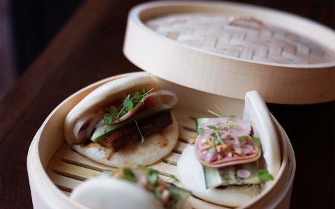 bao buns in wood steamer