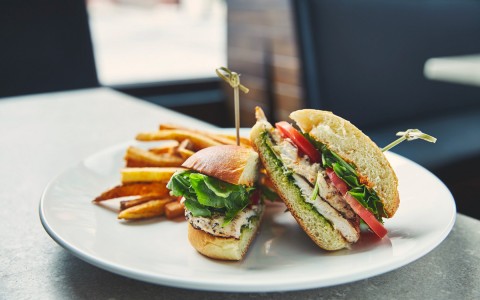 sandwich on a plate with fries