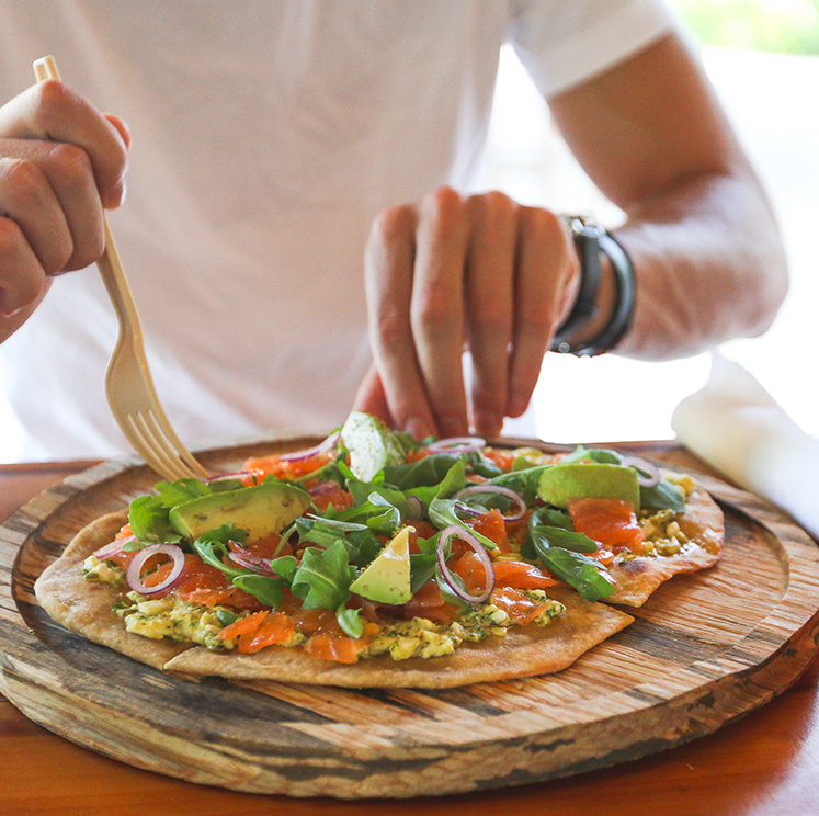 person cutting meal